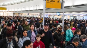 People wait in long TSA security lines at John F. Kennedy International Airport (JFK) in the Queens borough of New York, Monday, March 23, 2026.