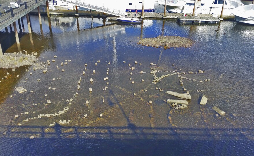 Swain made this miniature city from scraps of Belgian block and brick. It's only visible at low tide. He wants viewers to imagine the effects of sea level change on Boston.