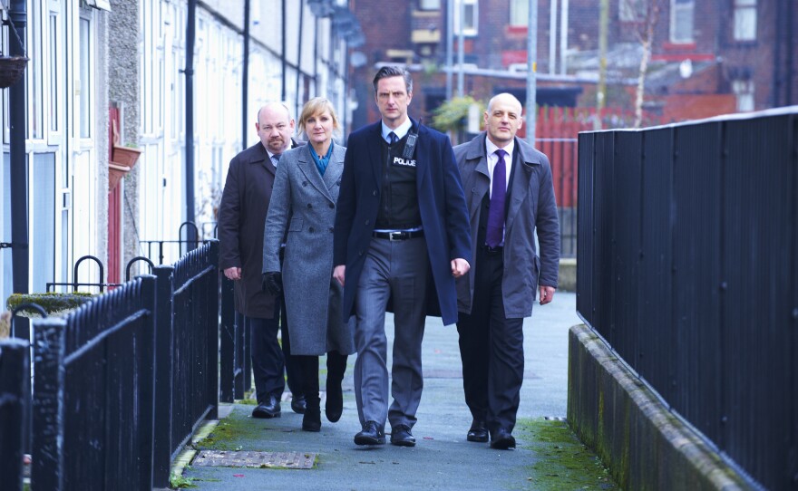 DS Andy Roper, DC Janet Scott, DC Ian Mitchell (David Prosho) and DC Pete Readyough (Tony Mooney) arrive at Dawn Nichol’s House (Erin Shanagher).