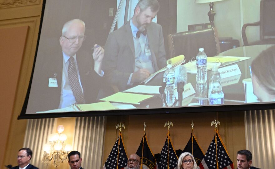 Trump lawyer John Eastman, left, is seen in a video during a hearing of the House select committee investigating the Jan. 6 insurrection on Thursday.