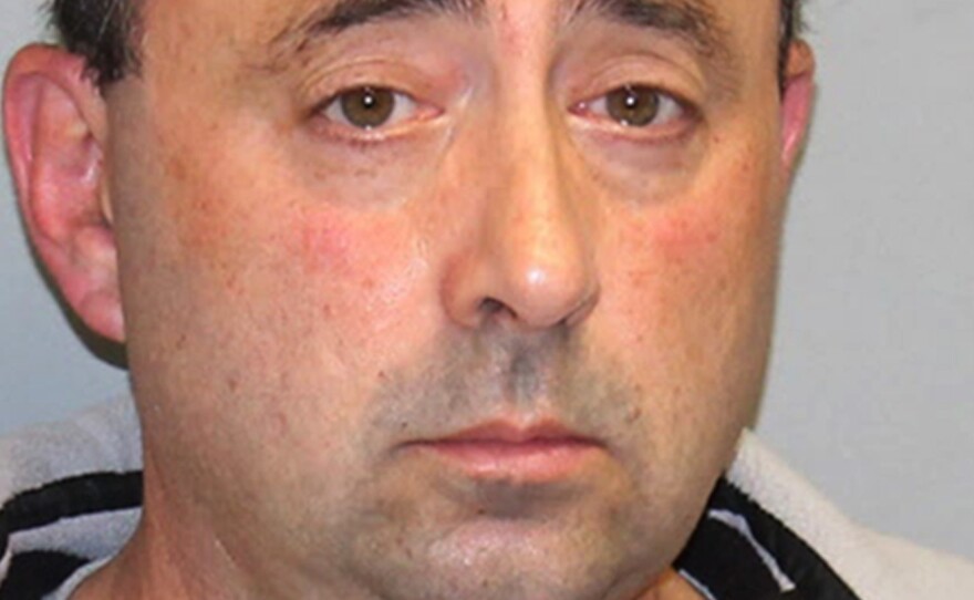 A photo provided by the Michigan Attorney General's office shows Dr. Larry Nassar, who treated female gymnasts and is accused by many of molesting them. He has agreed to plead guilty to child pornography charges on Tuesday.