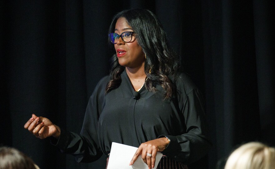 Thasunda Duckett, then an executive at JPMorgan Chase & Co., speaks during an investment conference in Dana Point, Calif., on Oct. 2, 2018. Duckett, currently the CEO of TIAA, says the Tulsa riots led to a erosion of trust by Blacks in the financial system.