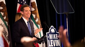 Mike Levin speaks to supporters at his campaign election party on Nov. 6, 2018.