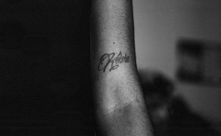 Stevens' sister Amirah Williams, 28, shows off her tattoo of their mother's name, Keisha — a symbol of love, legacy and appreciation.