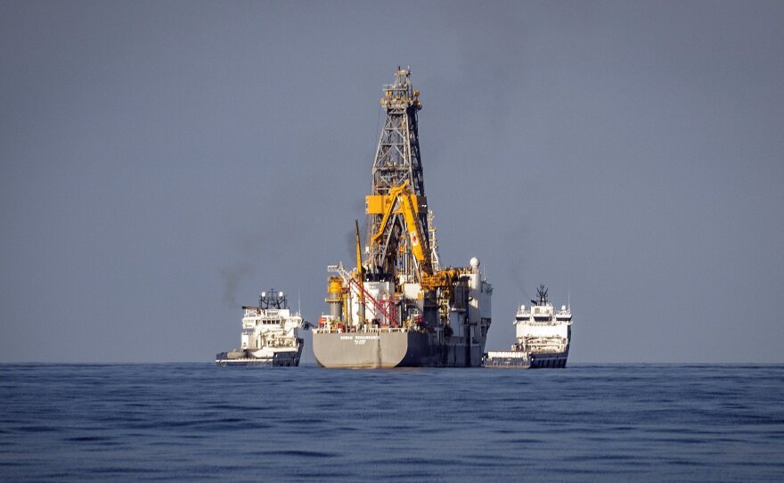 Spanish oil giant Repsol's ship Rowan Renaissance (center) sails off the coast of Lanzarote, Canary Islands, southwestern Spain, on Nov. 17. Repsol began drilling for oil in the area a day later.