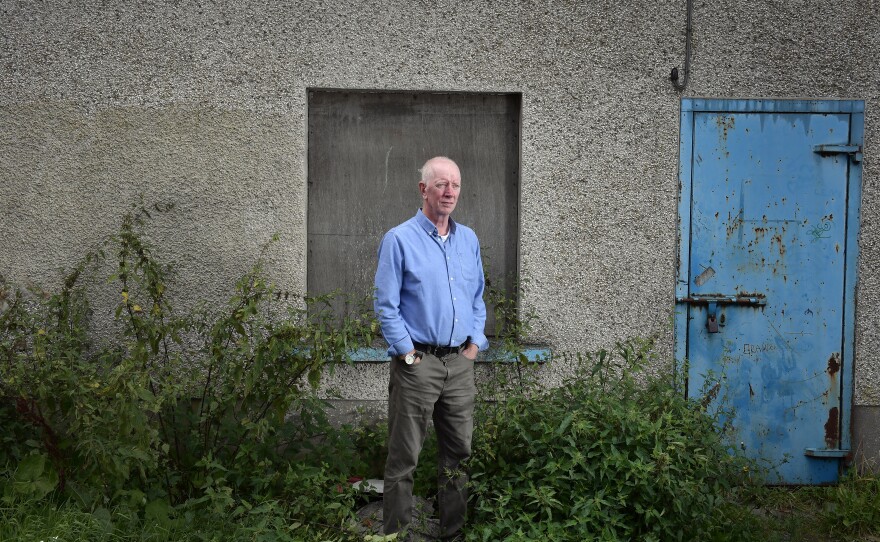 Paul Crawford poses for a photograph near his home in Glenavy, on the outskirts of Belfast, on Aug. 21. "Our streets were the trenches. That's where the bombs went off. That's where the gun battles were fought," says Crawford, 66. It took him  more than 40 years to get answers about who killed his father in 1974 — and why.
