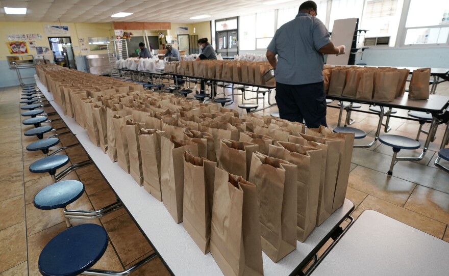 Jefferson County School District Food Service Department staff arrange some of the hundreds of free lunches that was given to students on March 3, 2021 in Fayette, Miss. As one of the most food insecure counties in the United States, many families and their children come to depend on the free meals as their only means of daily sustenance.