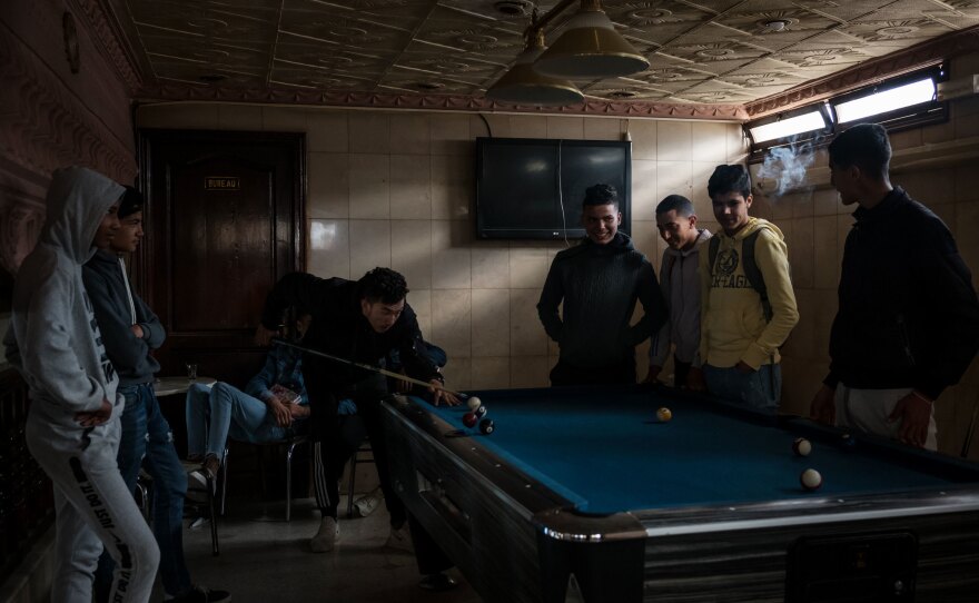 High school students play pool during a break between classes in Sousse, Tunisia, in February.