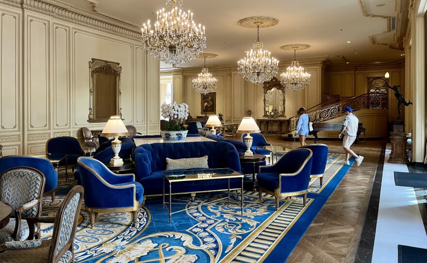 People walk inside the Westgate Hotel lobby, Sept. 24, 2025.