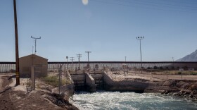 The All-American Canal is seen here in Imperial County, Calif. Jan. 24, 2022. Customs and Border Protection agents say this is a "high traffic" area for migrants. The border fence is just 26 yards south of the canal and the Interstate-8 highway is a short walk away. Migrants climb the fence, swim across the canal and meet a driver along the highway.