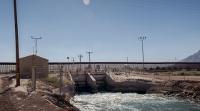 The All-American Canal is seen here in Imperial County, Calif. Jan. 24, 2022. Customs and Border Protection agents say this is a "high traffic" area for migrants. The border fence is just 26 yards south of the canal and the Interstate-8 highway is a short walk away. Migrants climb the fence, swim across the canal and meet a driver along the highway. 