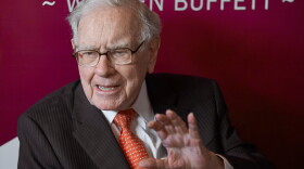 FILE - Warren Buffett, chairman and CEO of Berkshire Hathaway, speaks during a game of bridge following the annual Berkshire Hathaway shareholders meeting May 5, 2019, in Omaha, Neb.