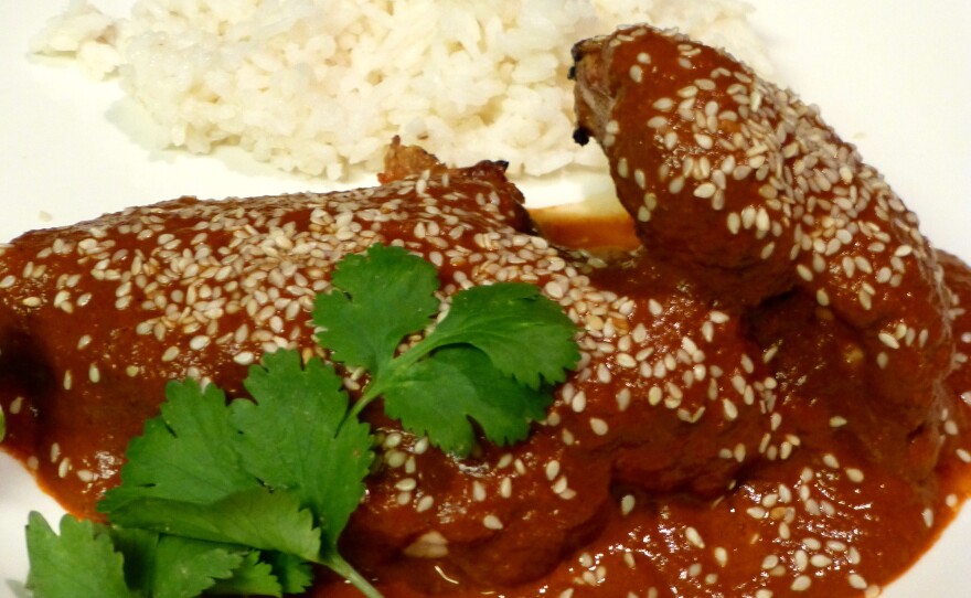 Here, Chocolate Mole is served over grilled chicken. But it's also commonly paired with pork