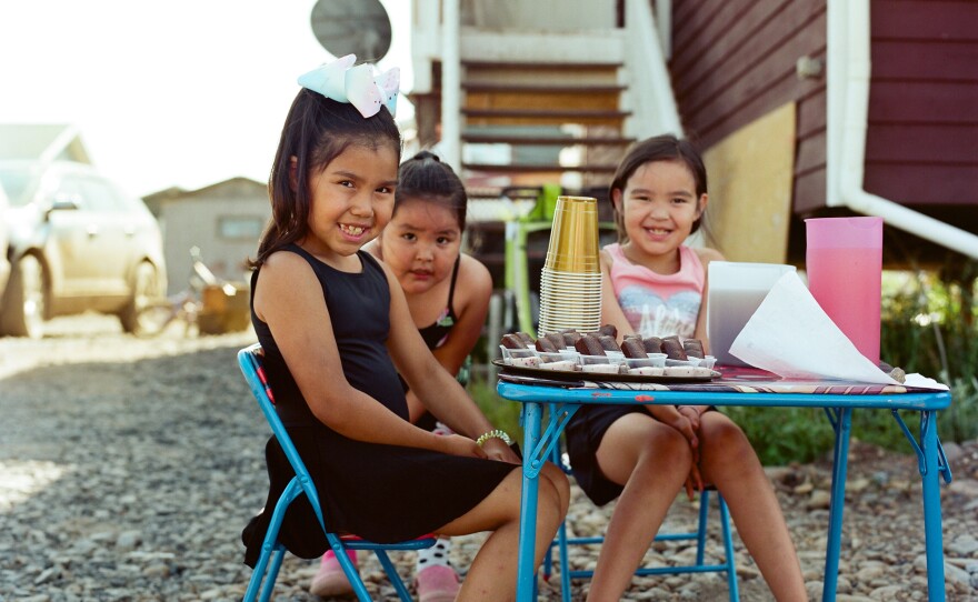 Children sell lemonade and snacks in Aklavik.