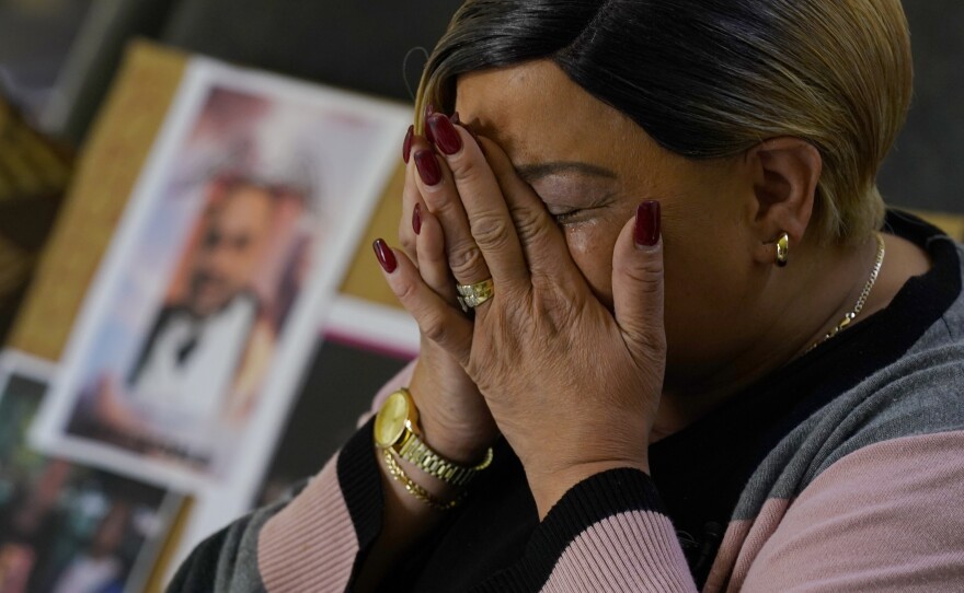 Penelope Scott holds her head in her hands as she talks about her son, De'vazia Turner, who was killed in the Sacramento shooting.