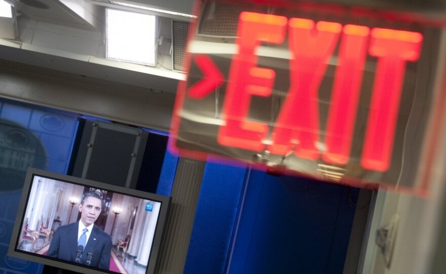 A television monitor in the White House briefing room displays  President Obama as he discusses his Afghanistan exit strategy, June 22, 2011.
