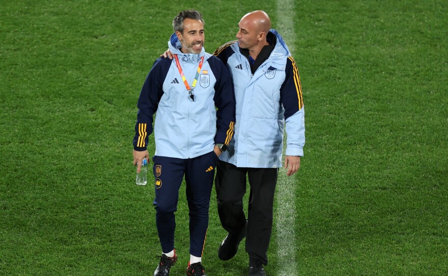 Spain coach Jorge Vilda, left, talks with Spain soccer federation president Luis Rubiales at a training session during the Women's World Cup last month.