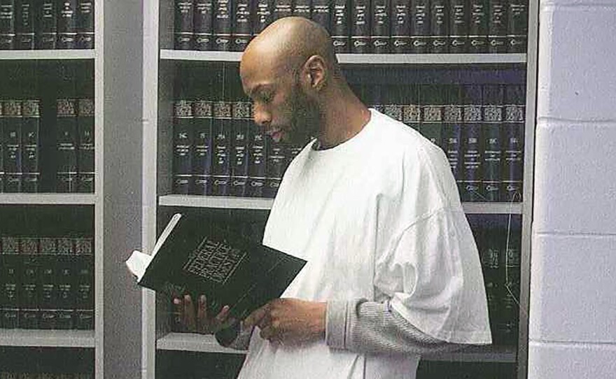 This 2015 photo provided by Shawn Nolan Chief, Capital Habeas Unit Community Federal Defender Office for the Eastern District of Pennsylvania, shows Dustin Higgs at the Federal Prison in Terre Haute, Ind. Higgs.