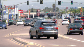 A car waits at an intersection on Convoy St. in Kearny Mesa,  Aug. 25, 2016. 