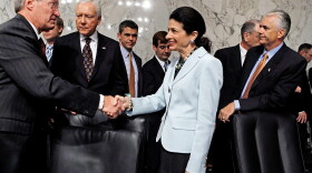 Senate Finance Committee Chairman Max Baucus (D-MT) (L) thanks Sen. Olympia Snowe (R-ME) (C) for voting in favor of health care reform legislation as committee Republicans Sen. Orrin Hatch (R-UT) (2nd L) and Sen. John Ensign (R-NV) (R) watch, on Capitol Hill October 13, 2009 in Washington, DC. 