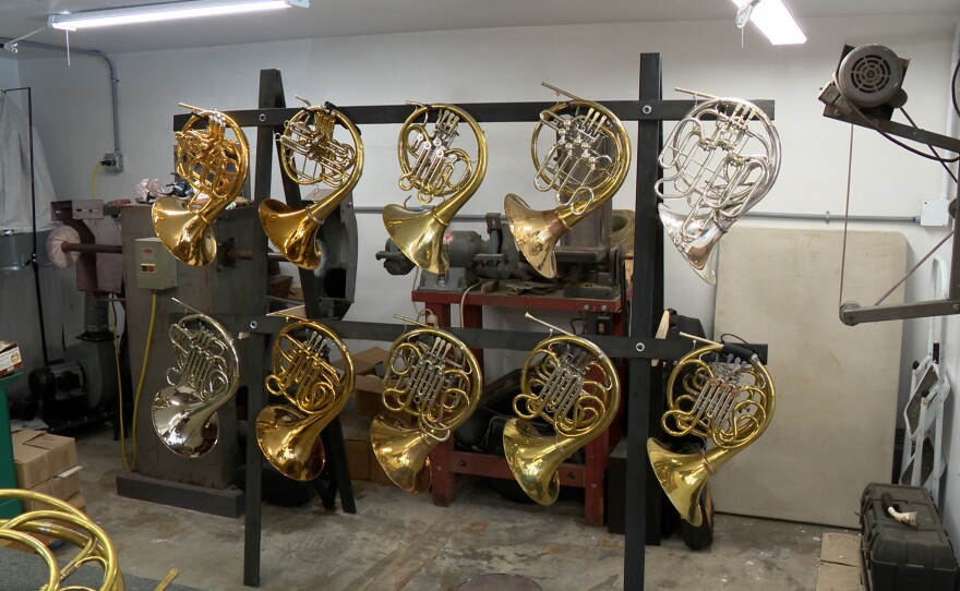A variety of French Horns are shown hanging on a rack at McCracken Horns on April 21, 2026.
