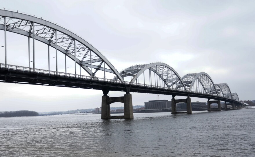 The Centennial Bridge over the Mississippi River connecting Davenport, Iowa and Rock Island, Illinois. Davenport's downtown suffered millions of dollars in lost business after flooding last year.
