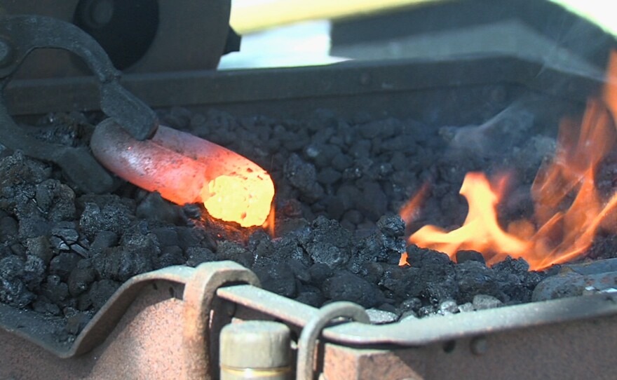 Blacksmith Don Faulkner creates chain links for the San Salvador.