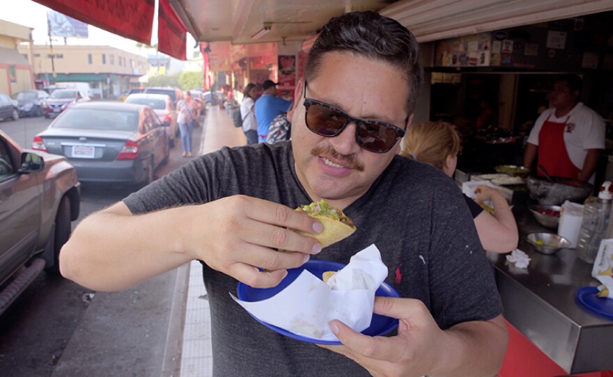 Host Jorge Meraz samples tacos from four different stands at Las Ahumaderas, which has been around since 1960, Tijuana, Mexico.