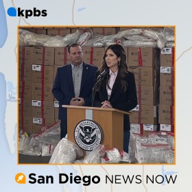 Homeland Security Secretary Kristi Noem is pictured at a podium during her visit to the Otay Mesa Port of Entry, Feb. 12, 2026.