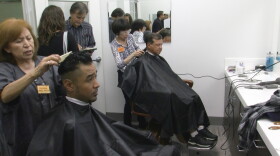 People who are homeless get haircuts at Father Joe's Villages downtown, April 23, 2019.