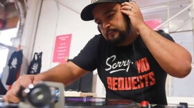 Jorge Gonzalez deejays at the Mexico in the Bottle annual mezcal and food festival in Logan Heights in this photo taken in March 2020.