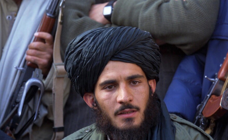 Tayyeb Agha at a Taliban press conference in November 2001 in Kandahar, Afghanistan.