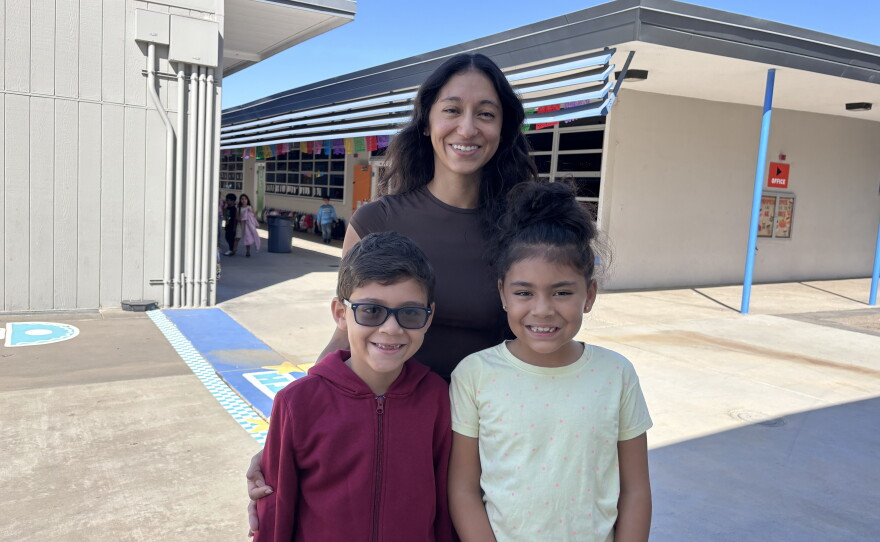 Abraham Solis (left), Isabela Solis and Valentina Solis gather for a photo at Bancroft Elementary School on Sept. 25, 2026.