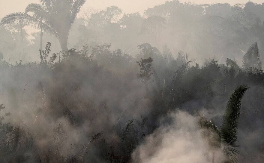 Smoke billows during a fire in an area of the Amazon rainforest near Humaita, Brazil, on Aug. 14.
