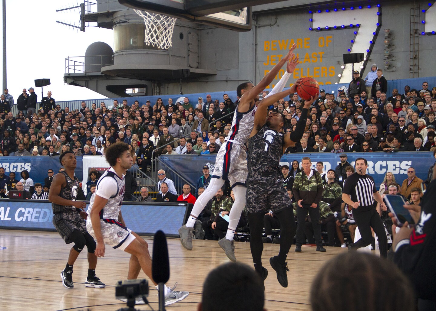 MSU guard Pierre Brooks goes for a layup during the Armed Forces Classic aboard USS Abraham Lincoln in San Diego on Nov. 11, 2022.