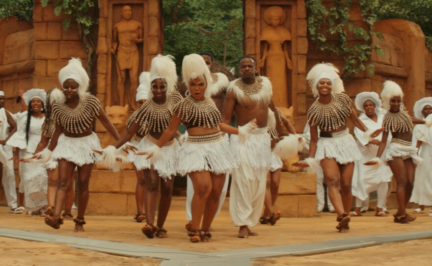 "It was once everyone was together and dressed and ready and in line, that it hit you that this was to honor of Chadwick," Carter says of <em>Wakanda Forever</em>'s funeral scene.