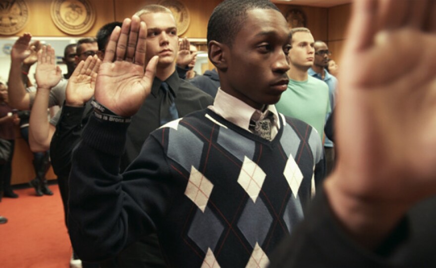 A young man taking the oath of enlistment at Ft. Hamilton, Brooklyn.