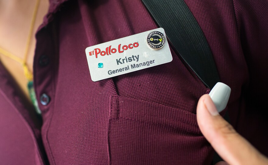 General Manager Kristy Ramirez decorated the name tag she recently received when she was promoted at one of Mendelsohn's El Pollo Loco franchises.