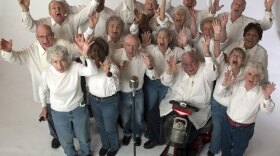 The Young@Heart chorus smiles for the camera.