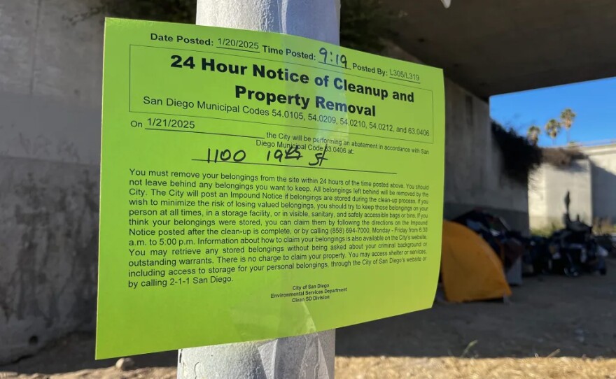 A flyer giving 24 hours’ notice before an encampment cleanup hangs in Downtown San Diego on Jan. 21, 2025.