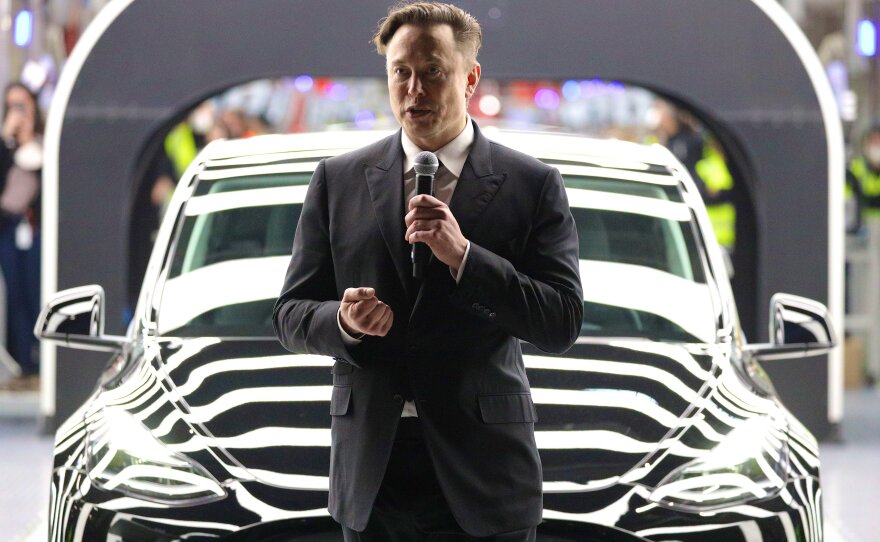 Tesla CEO Elon Musk speaks during the official opening of the new Tesla electric car manufacturing plant on March 22, 2022 near Gruenheide, Germany.