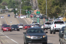 Cars fill the block of Campo Road in Casa de Oro where the Trump administration revoked a road safety grant, Sept. 30, 2025.
