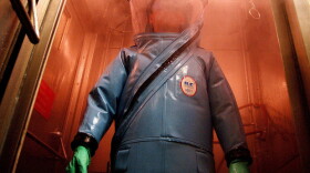 A researcher wears a biohazard suit at Fort Detrick, Md., where the FBI says Army scientist Bruce Ivins produced the deadly anthrax used in the 2001 anthrax attacks that killed five people. After Ivins committed suicide in 2008, the FBI accused him of the crime.