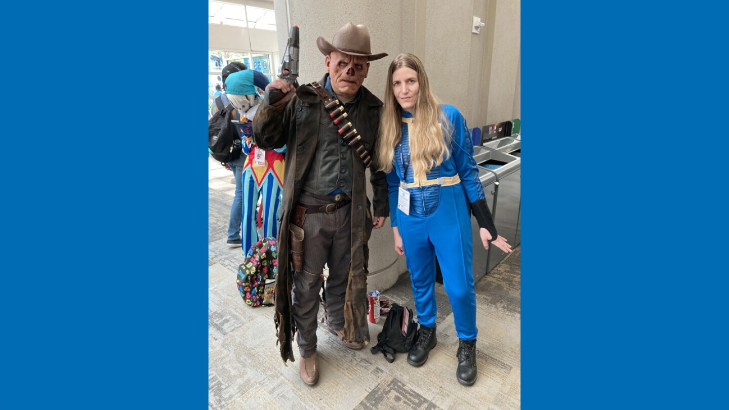Paul Ponce (left) and Patricia Bastian pose as characters from the Amazon Prime television show "Fallout" on July 26, 2024 at Comic-Con.