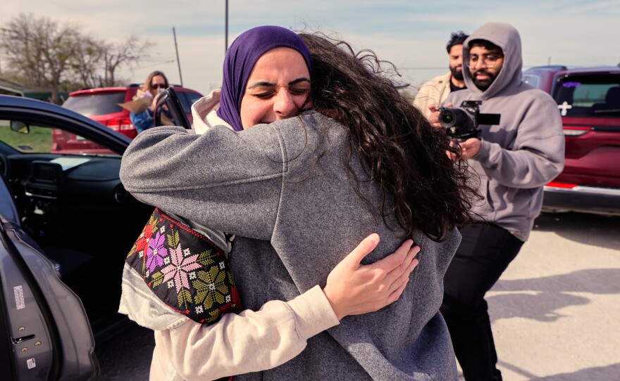 Leqaa Kordia, left, embraces friends, family and suppporters after being released from the Prairieland Detention Center in Alvarado, Texas, Monday, March 16, 2026.
