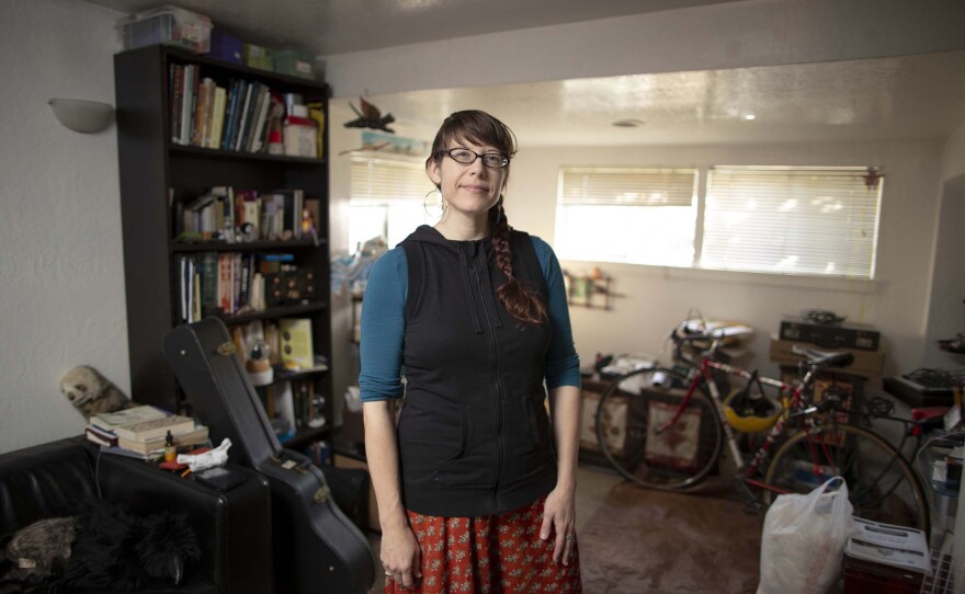 Michelle Krasowksi, who would like to buy a home one day, but she knows that day is a long way off, poses in this undated photo.