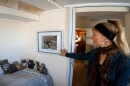 The founder and head of Shanti's House, Kristina Hancock, shows a KPBS crew around the sanctuary's main cottage on April 6, 2022.
