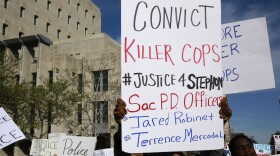 Protestors march down a street block an after the funeral for police shooting victim Stephon Clark, in Sacramento, Calif., Thursday, March 29, 2018. 