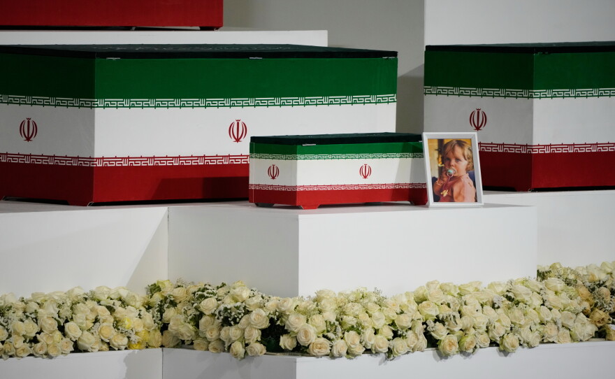 The casket of slain Iranian Supreme Leader Ayatollah Ali Khamenei's granddaughter, Zahra Mohammadi Golpayegani, is displayed alongside the caskets of Khamenei and other members of his family during a viewing ceremony ahead of the dayslong funeral ceremonies at the Imam Khomeini Mosalla Grand Mosque in Tehran, Iran, Friday, July 3, 2026.