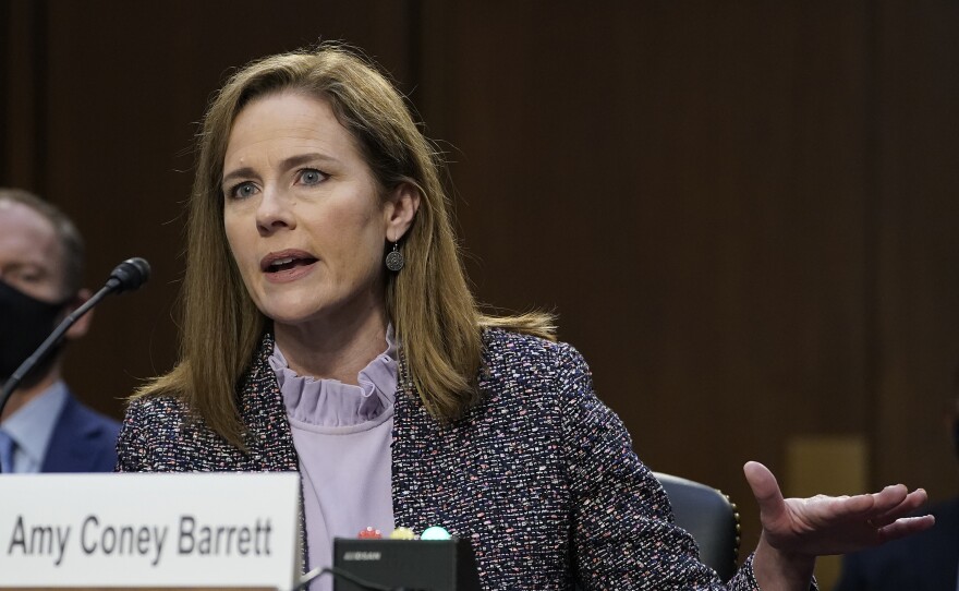 Supreme Court nominee Amy Coney Barrett testifies before the Senate Judiciary Committee during the third day of her confirmation hearings on Capitol Hill in Washington, Wednesday, Oct. 14, 2020. 